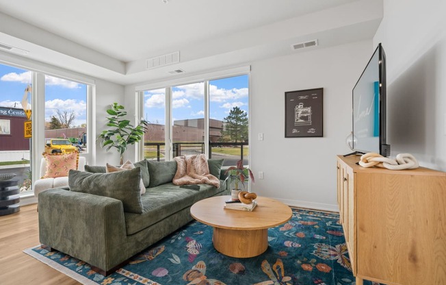 a living room with a couch and a coffee table