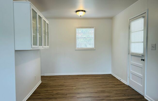 Fully renovated, 3 bed, 1 full bath, new LVP, new paint, granite counters, 2 driveways, carport, W/D hookups, must see!