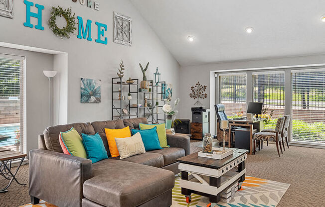 a living room with a couch and a table