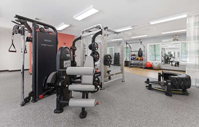 a fully equiped gym with weights machines and other exercise equipment