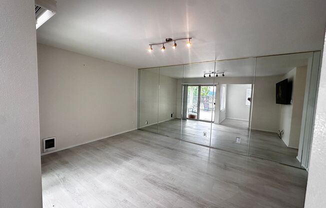 Updated 2-Bedroom Condo with Water Views, 2 Parking Spaces & Poolside Location