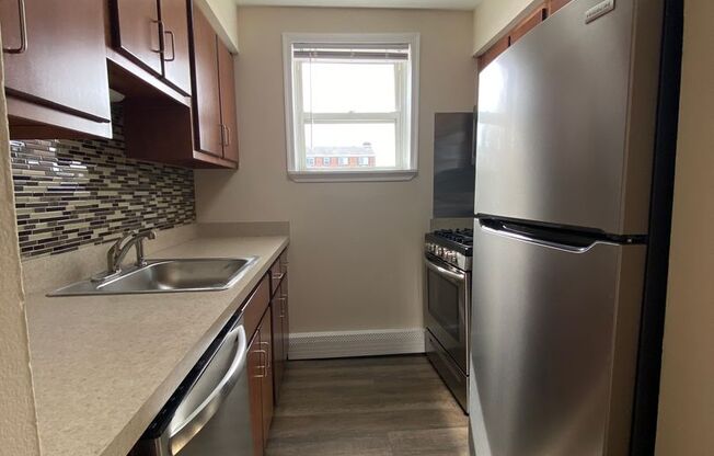 2 beds, 1 bath, 874 sqft, $1,465, Unit L-11