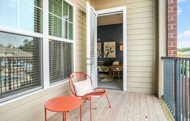 A Red Chair in a Balcony at The Aster Apartments, North Carolina, 27519
