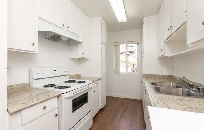 Kitchen with White Appliances and White Cabinets