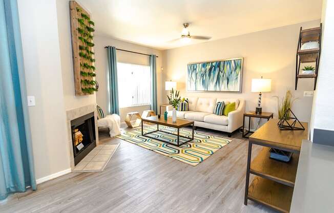 living room at the oaks of westchase apartments in houston, tx