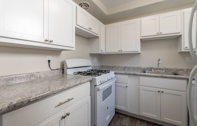 This is a photo of the kitchen in the 631 square foot, 1 bedroom/1 bath Montgomery floor plan at Colonial Ridge Apartments in the Pleasant Ridge neighborhood of Cincinnati, OH.