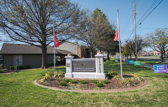 A sign in front of a house that says