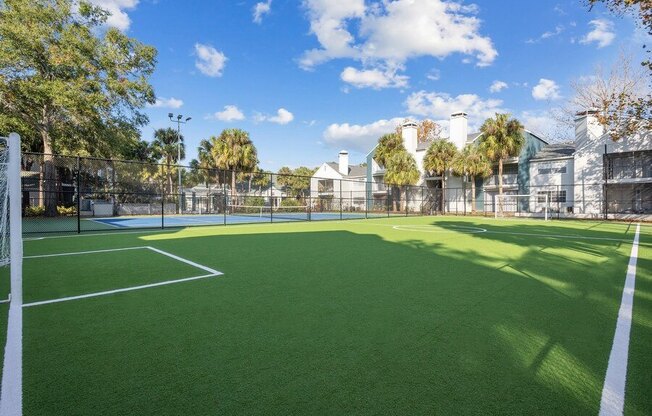 Outdoor Turf Soccer Field at Caribbean Breeze Apartments in Tampa, FL.