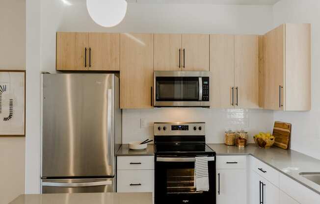 Gourmet Kitchen with Modern Appliances at Parc at Day Dairy Apartments and Townhomes, Utah, 84020