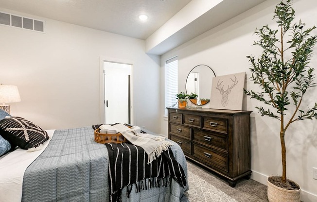 bedroom with a bed and a dresser