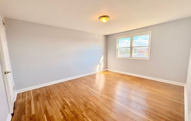 Charming Brick Home with Finished Basement, Modern Kitchen & Spacious Yard