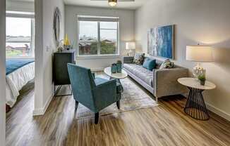 living room with beautiful green chairs at Brixton South Shore, Austin, 78741