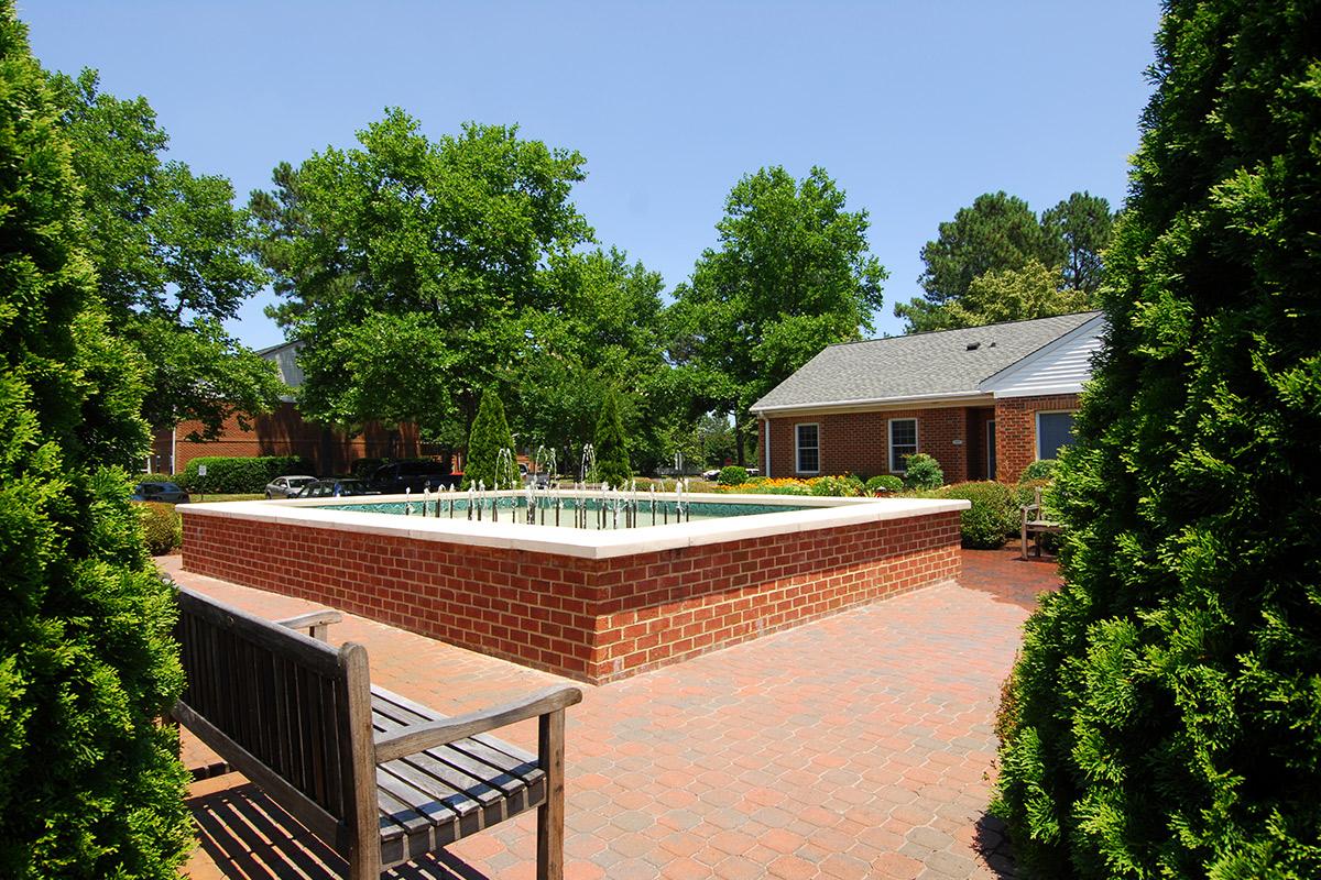 a bench in front of a house