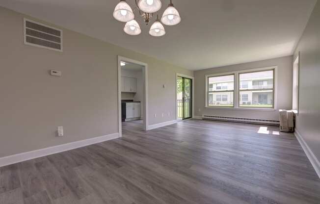 the living room and dining room in a new home