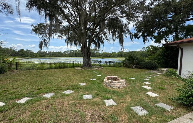 Eustis Lake Front Home with 2 Primary Bedrooms!