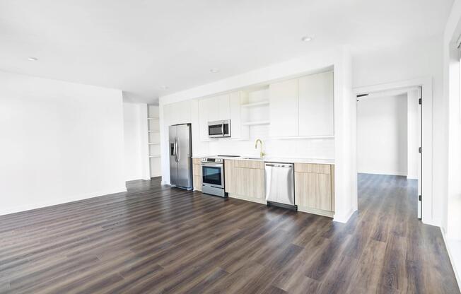 An open, light-filled kitchen anchors this Nashville home at Modera Nations, with clean lines, refined finishes, and space designed for effortless everyday living.