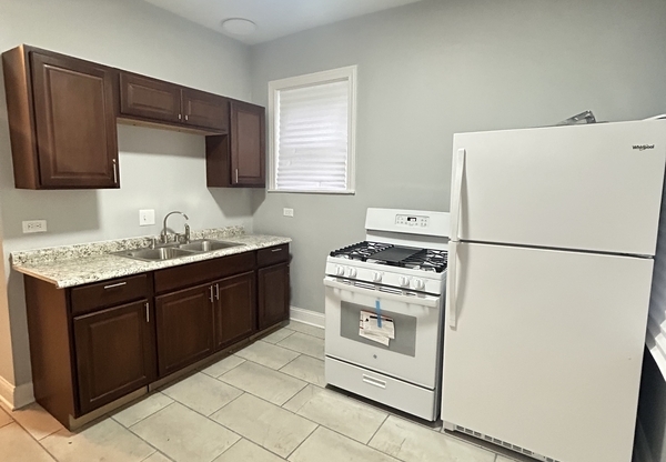 1852 W 58 ST