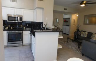 GORGEOUS FULLY FURNISHED 2 BEDROOM UNIT*GATED COMMUNITY*COMMUNITY POOL & SPA!