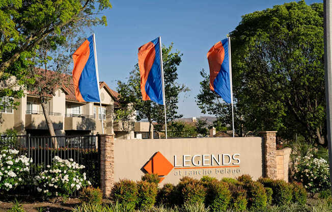 The sign for Legends at Rancho Belago is displayed in front of a building.