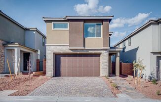 Single family home in ideal Summerlin location with open great room style kitchen and living area.