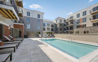 Relax poolside at Modera Newton in Newton, MA.