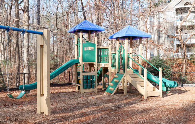 The Crest at Berkeley Lake playground with swing set located in Duluth, GA 30096