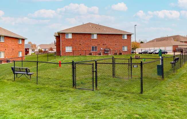 Large fenced dog park with grass at Northridge Heights apartments in Lincoln