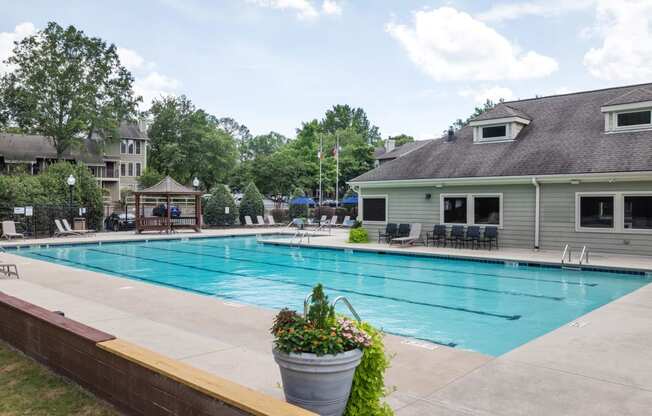 the swimming pool with a building in the background