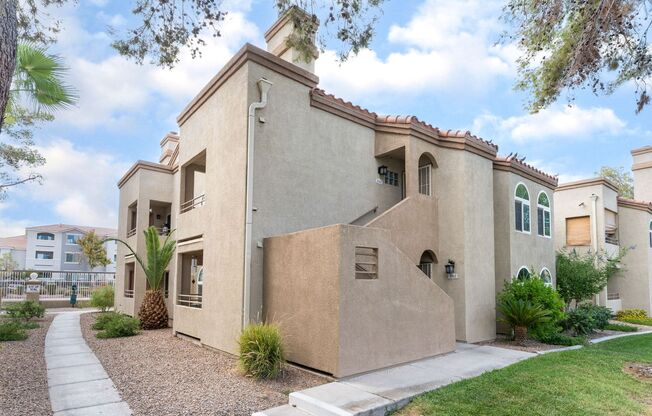 Welcome to this inviting 3-bedroom, 2-bath upstairs condo at 3145 E. Flamingo Rd #2061