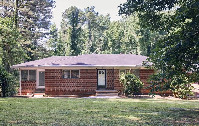 Vintage Charm with Modern Upgrades and Sunroom Living