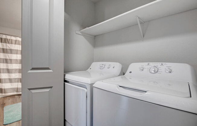 a washer and dryer in a laundry room