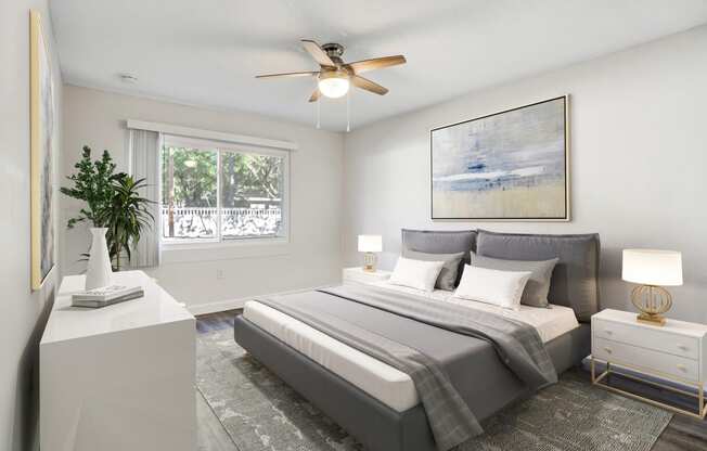 Square One Apartments in Gainesville, FL photo of bedroom with ceiling fan