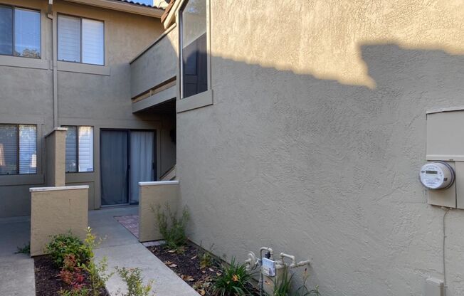 Two bedroom condo in Gated Community with 2 car garage!