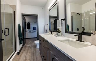 Luxury Bathroom with Double Vanity & Quartz Countertops with Expansive Closets