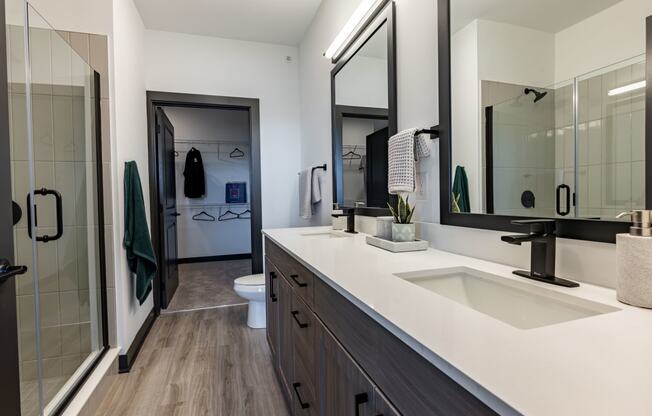 Luxury Bathroom with Double Vanity & Quartz Countertops with Expansive Closets