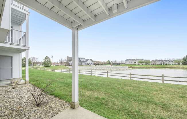 Patio with Enclosed Storage at The Crossings Apartments, Grand Rapids, Michigan