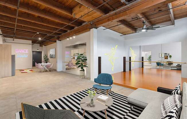 A dance studio is located in the back of this open plan office space.