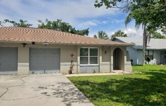 Location Location Location of this nice 3 bed 2 bath 1 car garage duplex in Cape Coral!