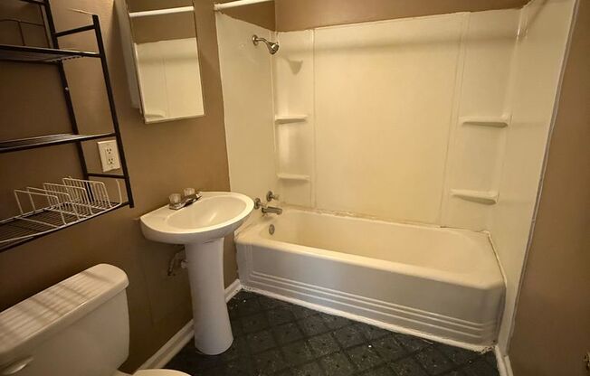 Charming 2-Bed End Unit in Quiet Quadplex- Move In Ready!