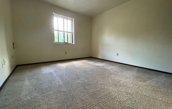 Amazing One Bedroom on the Second Floor! Built in A/C, Exposed Brick & More! Call Today!
