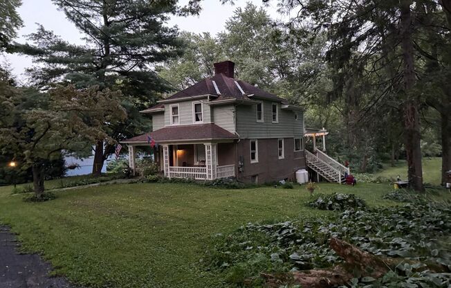 Riverfront home in a quiet spot, 3 acres, deck, parking, laundry, storage, fireplace