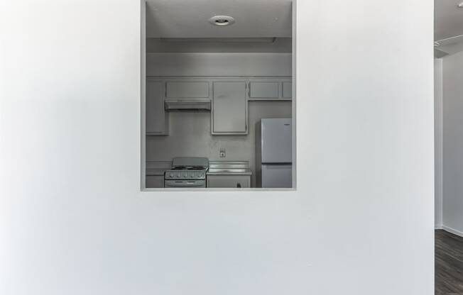 a view of a kitchen from a window