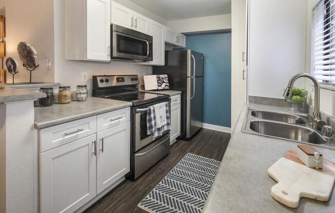 updated kitchen with stainless steel appliances