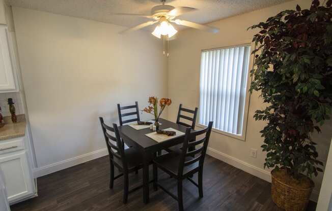 This is a photo of the dining room in the 653 square foot 1 bedroom apartment at Princeton Court Apartments in Dallas, TX.