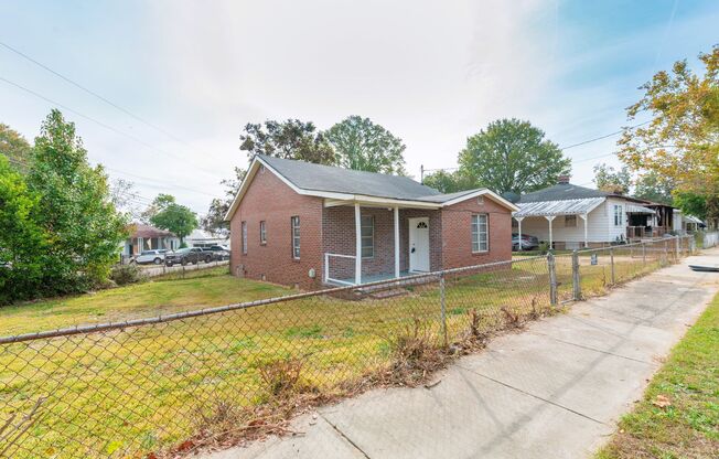 Brick home with a fenced-in yard!