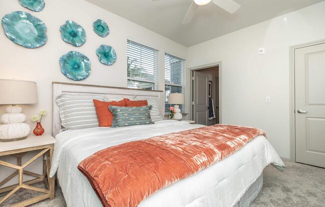 a bedroom with a large bed in a hotel room