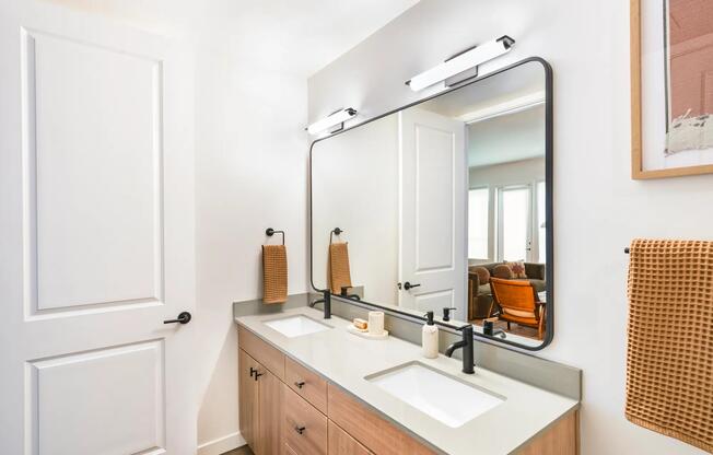 Enjoy dual vanities in your primary suite at Modera Higley Commons.