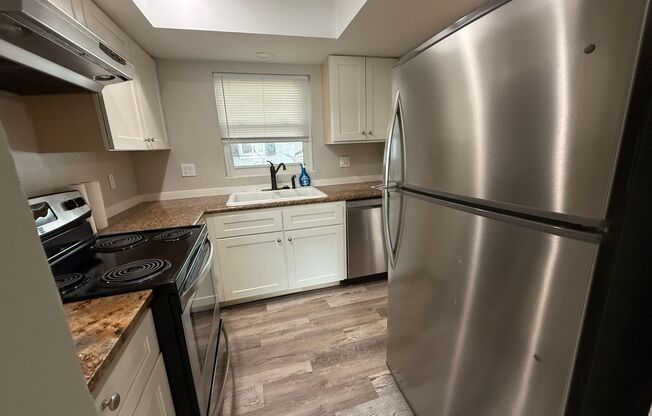 2/1 UPDATED UNIT in a Triplex