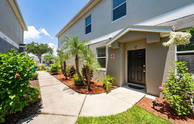 Beautifully updated condo featuring 3 spacious bedrooms, 2.5 bathrooms, a 2-car garage