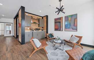 A modern living room with wooden floors and furniture.